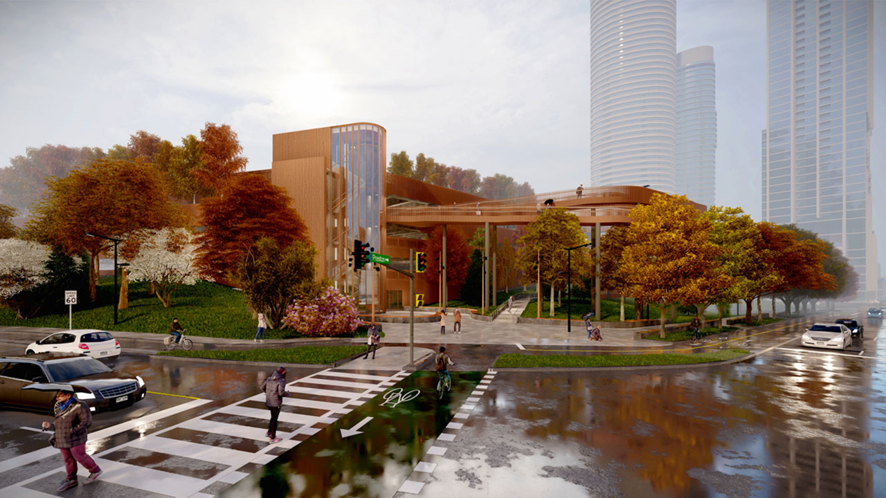 An artist rendering of the parking garage at The Ottawa Hospital’s new campus on a wet and rainy fall day. Surrounded by trees, the entrance to the parking garage has tall windows that show the multi-level stairwell inside. There are cars parked on the side of the street and stopped at the intersection of Preston Street and Prince of Wales Drive. People are walking across the intersection and in front of the building. 