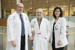 Dr. Harold Atkins (middle), neurologist Dr. Mark Freedman (left) 