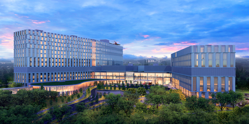 An artist rendering of the exterior of The Ottawa Hospital's new campus during the day, showing the exterior main entrance of the hospital and trees in the foreground. A helicopter is on the helipad on the roof of the building.